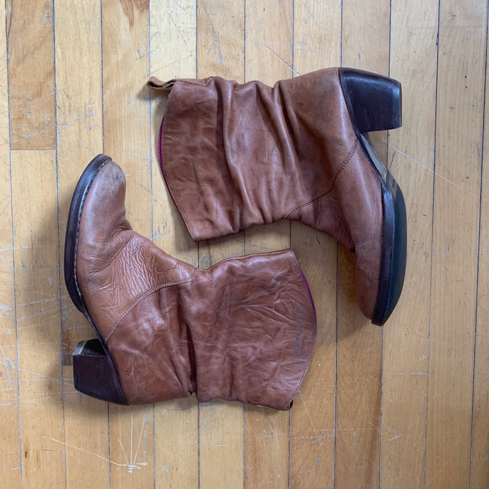 Tan leather cowboy style boots